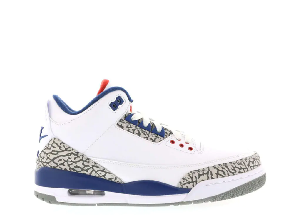 Air Jordan 3 in white with true blue and red accents and grey elephant print overlays, side profile on a white background